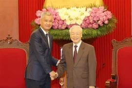 阮富仲总书记会见老挝人民革命党中央书记处书记、万象市委书记