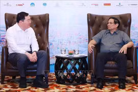 越南政府总理范明政会见泰国SCG集团董事长兼首席执行官塔马萨·瑟多敦。图自越通社