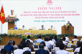 范明政在会上发言。图自越通社