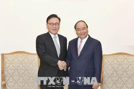 越南政府总理阮春福会见越南驻韩国釜山和庆尚南道地区名誉总领事朴秀冠