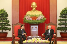 越共中央总书记阮富仲会见老挝政府总理通伦•西苏里