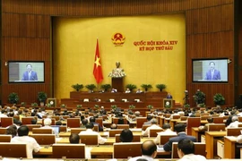 越南第十四届国会第六次会议讨论促进经济社会同步协调发展的措施