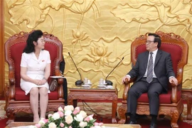 越共中央对外部部长黄平君会见朝鲜社会主义妇女同盟代表团