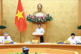 政府总理范明政主持召开政府9月份立法工作专题会议。图自越通社
