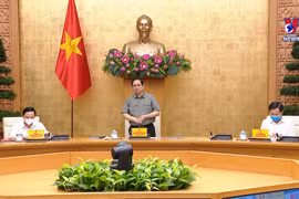 越南政府总理范明政主持国家新冠肺炎疫情防控指导委员会会议