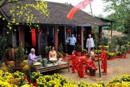 附图：全社会将帮助优抚家庭和贫困者过好春节。 （图片来源：越南人民报）