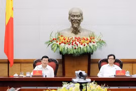 国家主席、中央司法改革指导委员会主任张晋创，政府党干事委员会书记、政府总理阮晋勇共同主持会议。