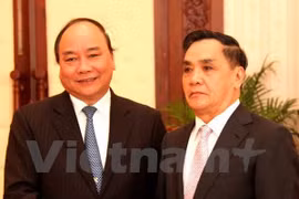 越南政府副总理阮春福与老挝政府总理通辛·坦马冯