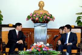 越南政府副总理范平明会见中国云南省省委副书记仇和