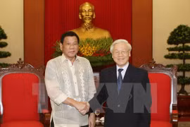 越共中央总书记阮富仲会见菲律宾总统杜特尔特。（图片来源：越通社）