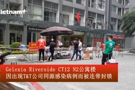 河内继续对出现新冠肺炎确诊病例的公寓楼进行封锁