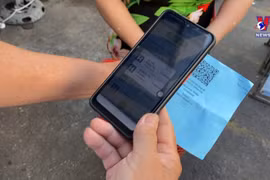 胡志明市菜市场采用购物券 尽力避免病毒接触传播