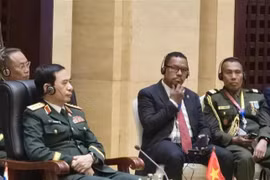 越南国防部长潘文江大将率团出席会议。图自越通社