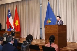 越南国家主席梁强在智利大学发表演讲。图自越通社