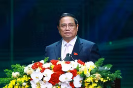 越南政府总理范明政出席了题为“奋勇向前 迈入绿色纪元”的2024年第九次“国家品牌”产品公布仪式并发表讲话。图自越通社
