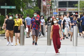 东南亚新冠肺炎疫情持续蔓延 新加坡、马来西亚出台经济援助计划