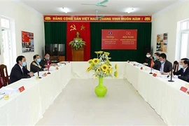 清化省与老挝华潘省互相分享疫情防控经验
