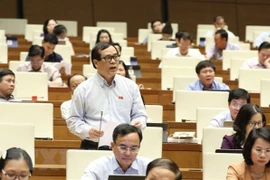  第十四届国会第九次会议：讨论经济社会和国家预算问题