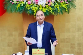 政府总理阮春福：改善工人生活水平和工作条件是紧迫与重要任务