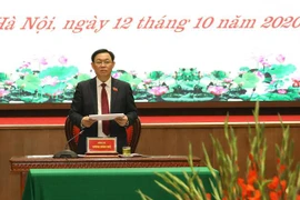 迎接党的十三大：王廷惠同志以100%赞成票再次当选河内市委书记