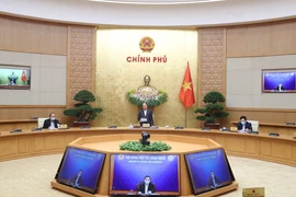 政府总理阮春福：坚决不让经济崩塌