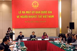 越南国家残疾人委员会成立仪式场景（图片来源：越南民智报）