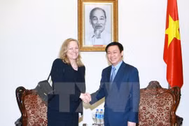 越南政府副总理王廷惠与世界银行副行长兼多边投资担保机构总裁冯桂婷