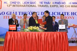 双方签署仪式。（图片来源：越通社） 