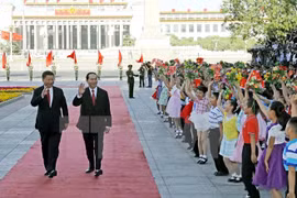 中共中央总书记、国家主席习近平举行仪式欢迎越南国家主席陈大光一行。