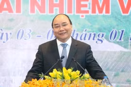 阮春福总理出席越南电力集团2017年任务部署会议。(图片来源：越通社）