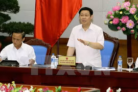 政府副总理王廷惠在会议上发表讲话。（图片来源：越通社）