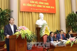 陈大光主席在会议上发表讲话（图片来源：越通社）