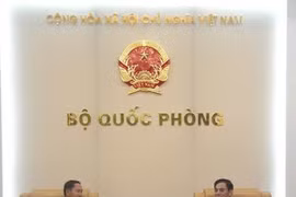 越南人民军总参谋长潘文江中将会见老挝人民军副总参谋长坎良•乌塔凯山少将（图片来源：http://www.qdnd.vn）