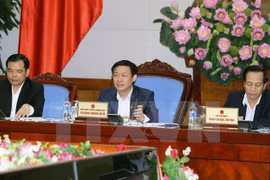 ​王廷惠副总理（图中）在会议上发表讲话（图片来源：越通社）