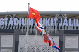 11个国家体育代表队举行升旗仪式。（图片来源：越通社）