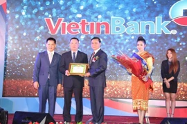 越南工商银行（Vietinbank）老挝分行建立5周年纪念典礼（图片来源：越南人民报）