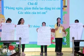 困难儿童参加主题为“预防和减少童工”的论坛。图自越通社