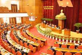 越共十三届九中全会闭幕会场景。图自越通社