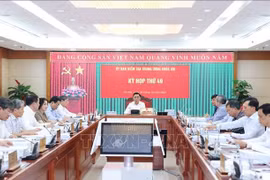 会议场景。图自越通社