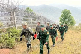 越南和中国边防部队进行双边巡逻。图自越通社