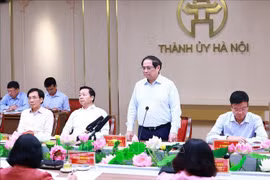 越南政府总理范明政发表讲话。图自越通社