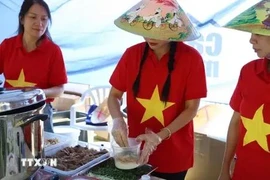 南非越南河粉日 向非洲朋友推广越南美食。图自越通社