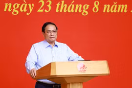 越南政府总理范明政发表讲话。图自越通社