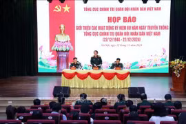 新闻发布会场景。图自越通社