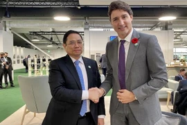 范明政总理会见加拿大总理和赞比亚总统