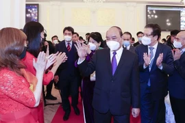 越南国家主席阮春福会见在俄罗斯越南人代表