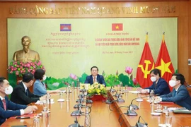 促进越共中央宣教部与柬埔寨人民党中央宣教委员会的合作