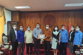 新冠肺炎疫情：在老越南人社群同老挝政府携手共同抗击疫情