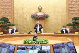 政府总理范明政：更好控制疫情 推动各项经济社会发展