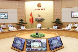 政府总理范明政与全国63个省市和县市视频连线讨论疫情防控工作
